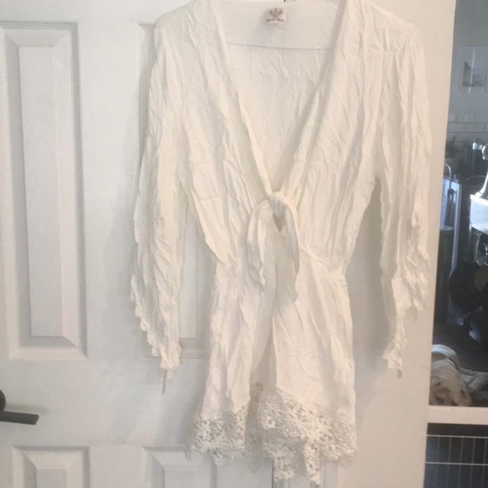White crepe long-sleeved romper with tie front